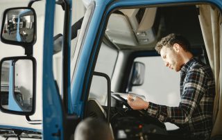 A CMV driver completes a health history questionnaire in preparation for his CDL Physical.